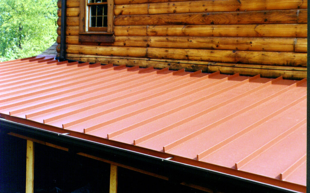 Red Standing Seam Metal Roof Awning on wood finished house