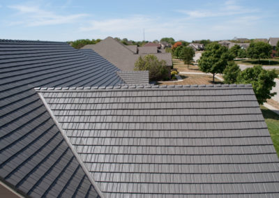 Close up of Cedar Shake Gray Metal Roof