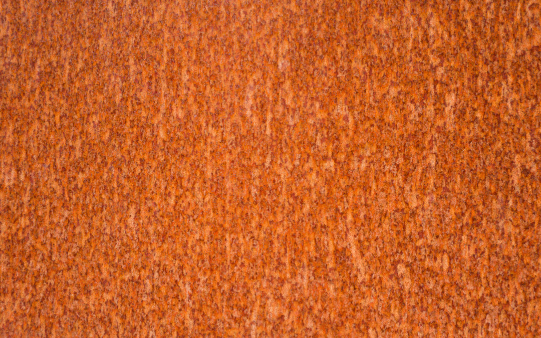 Rust spots on a steel plate to illustrate Do Metal Roofs