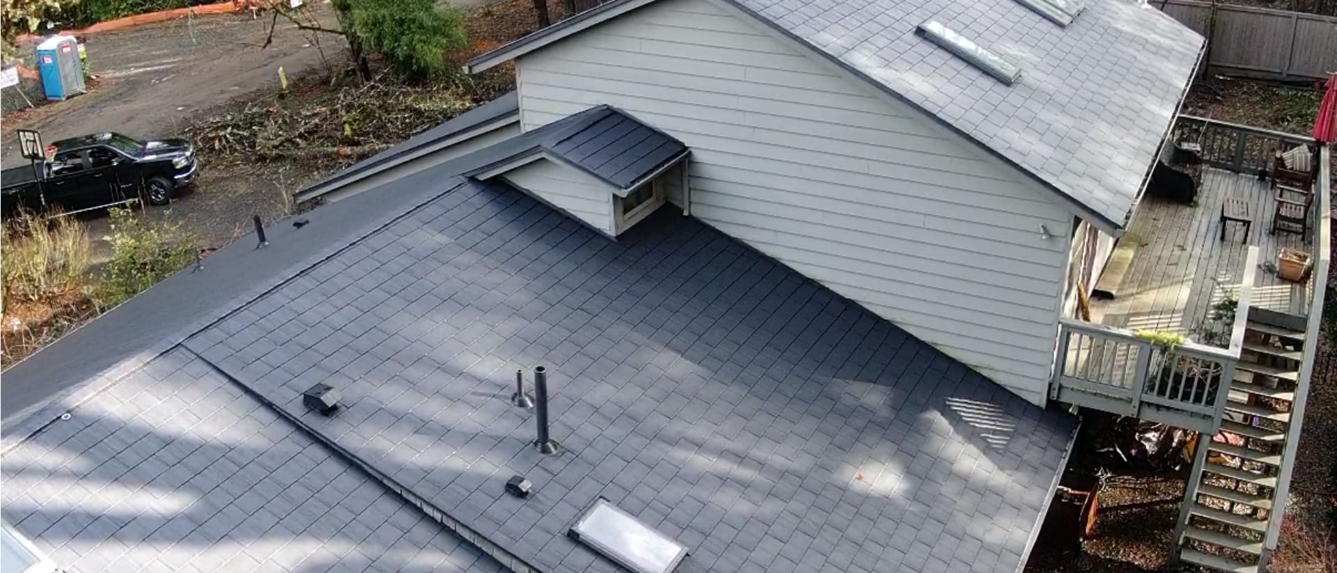 Metal roof installation on a residential two story home